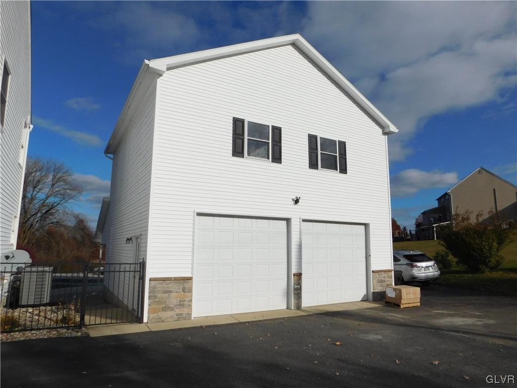 1240 Miller Road Wind Gap, PA 18091 - Photo 48 of 48 a view of a house with a garage