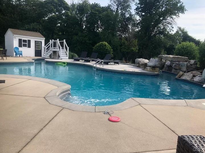 1240 Miller Road Wind Gap, PA 18091 - Photo 9 of 48 a view of a lake with a house