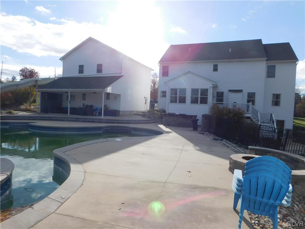 1240 Miller Road Wind Gap, PA 18091 - Photo 10 of 48 a view of a house with a patio