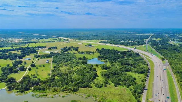 a view of a yard with an outdoor space