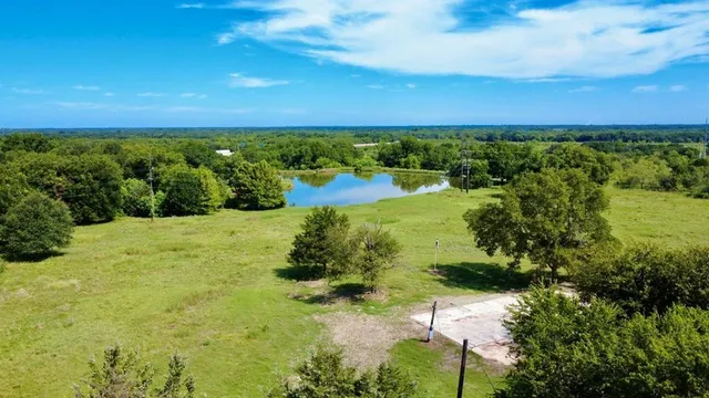 a view of a yard with an outdoor space