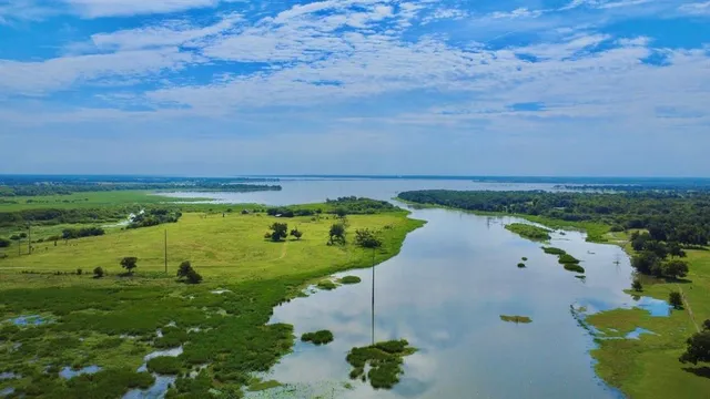 a view of a lake with an outdoor space