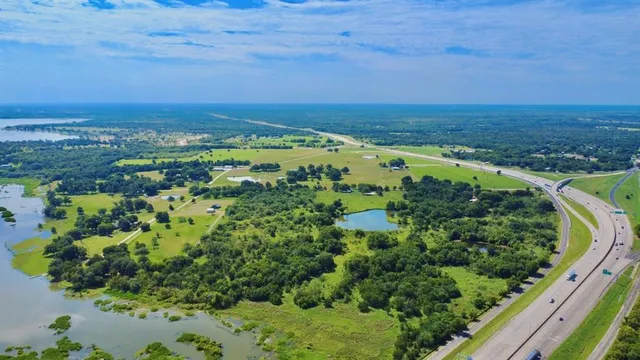 a view of a city with an ocean