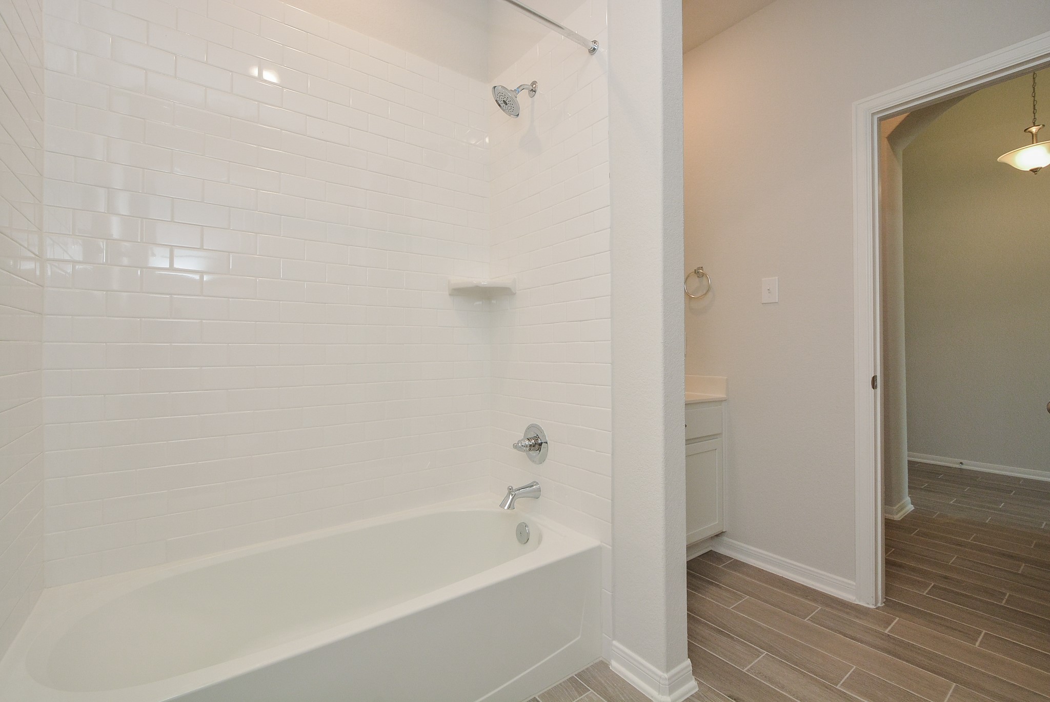 8634 Herring Lane Cypress, TX 77433 - Photo 14 of 50 a bathroom with a bathtub