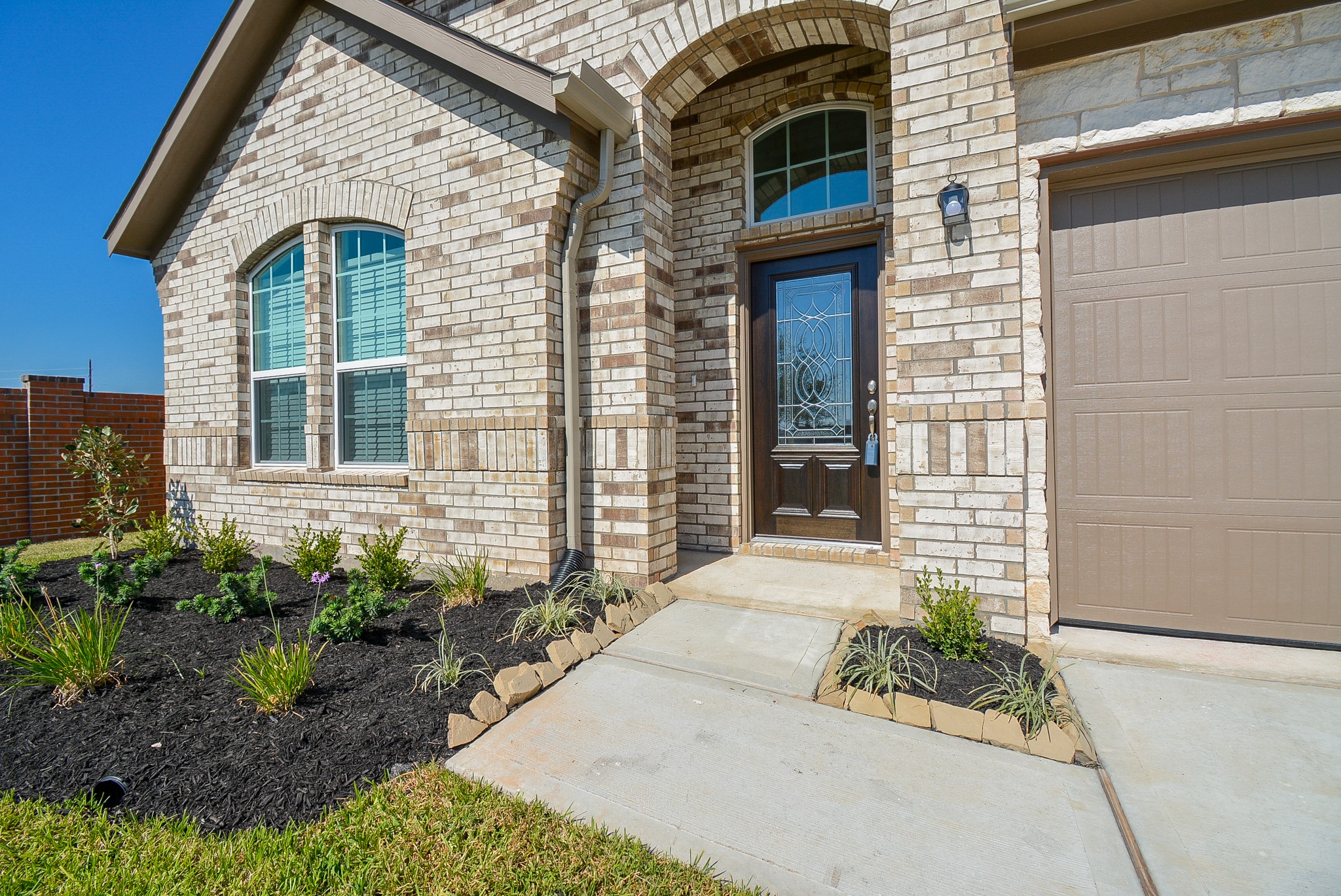 8634 Herring Lane Cypress, TX 77433 - Photo 3 of 50 a front view of a house with a yard