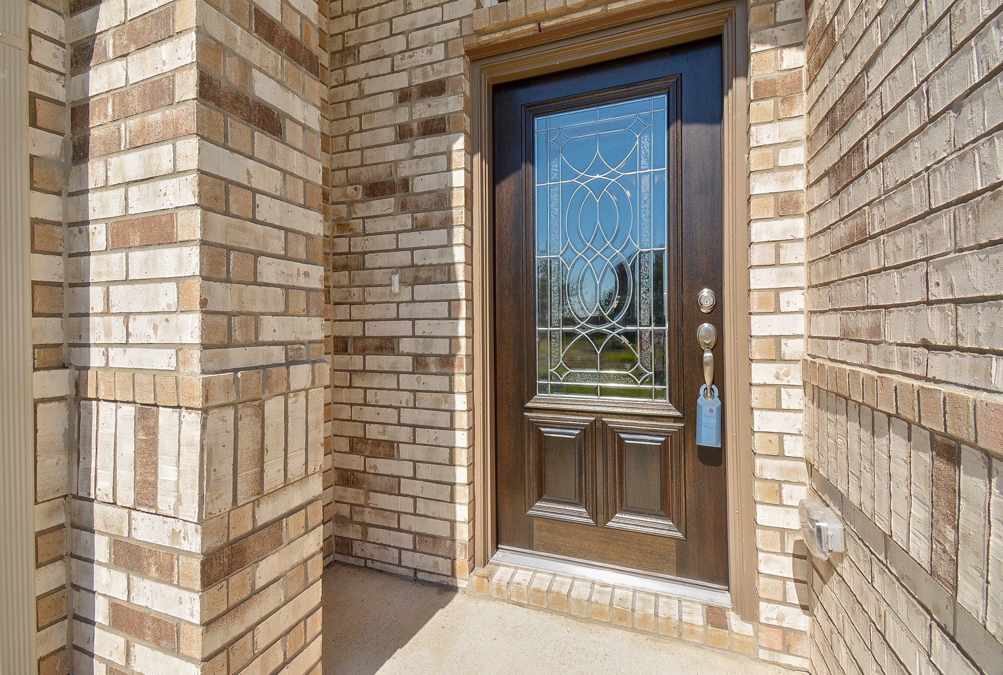 8634 Herring Lane Cypress, TX 77433 - Photo 4 of 50 a view of a brick wall of the house