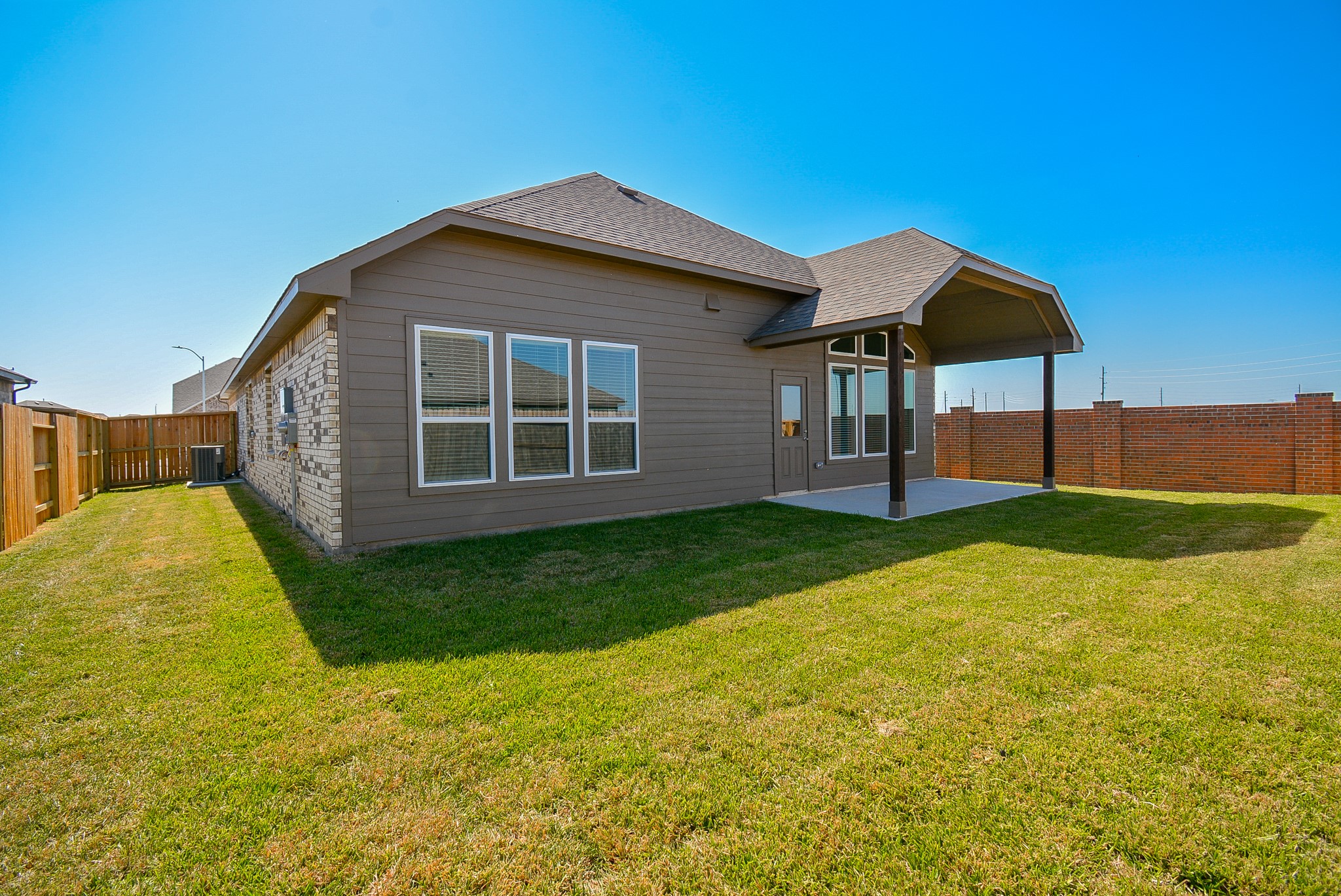 8634 Herring Lane Cypress, TX 77433 - Photo 46 of 50 a view of a house with backyard