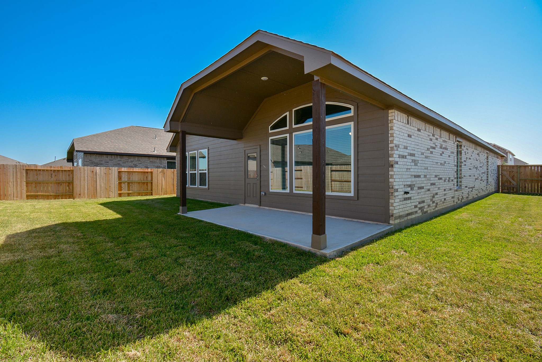 8634 Herring Lane Cypress, TX 77433 - Photo 47 of 50 a front view of a house with garden