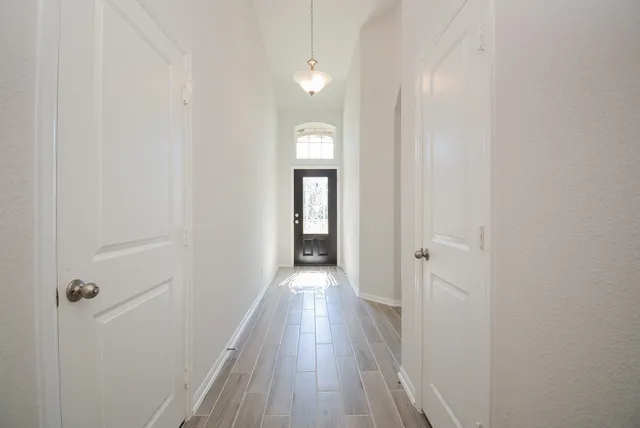 a view of entryway with wooden floor