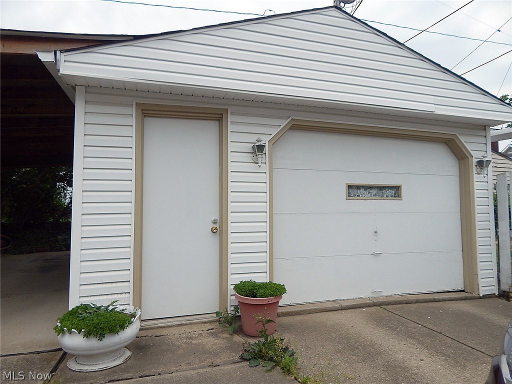 2212 Ralph Avenue Cleveland, OH 44109 - Photo 15 of 15 One car garage with automatic garage door.