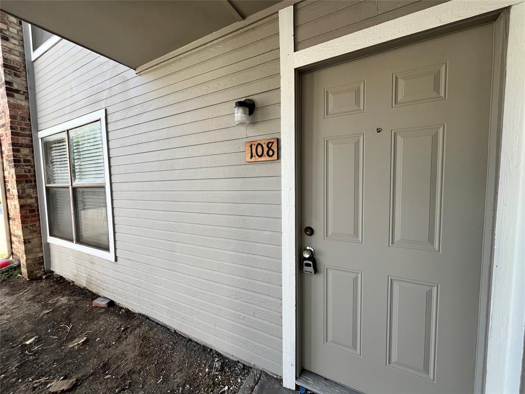 2526 West Prairie Street, Unit 108 Denton, TX 76201 - Photo 1 of 12 Here is the front entrance featuring an accented address number label.