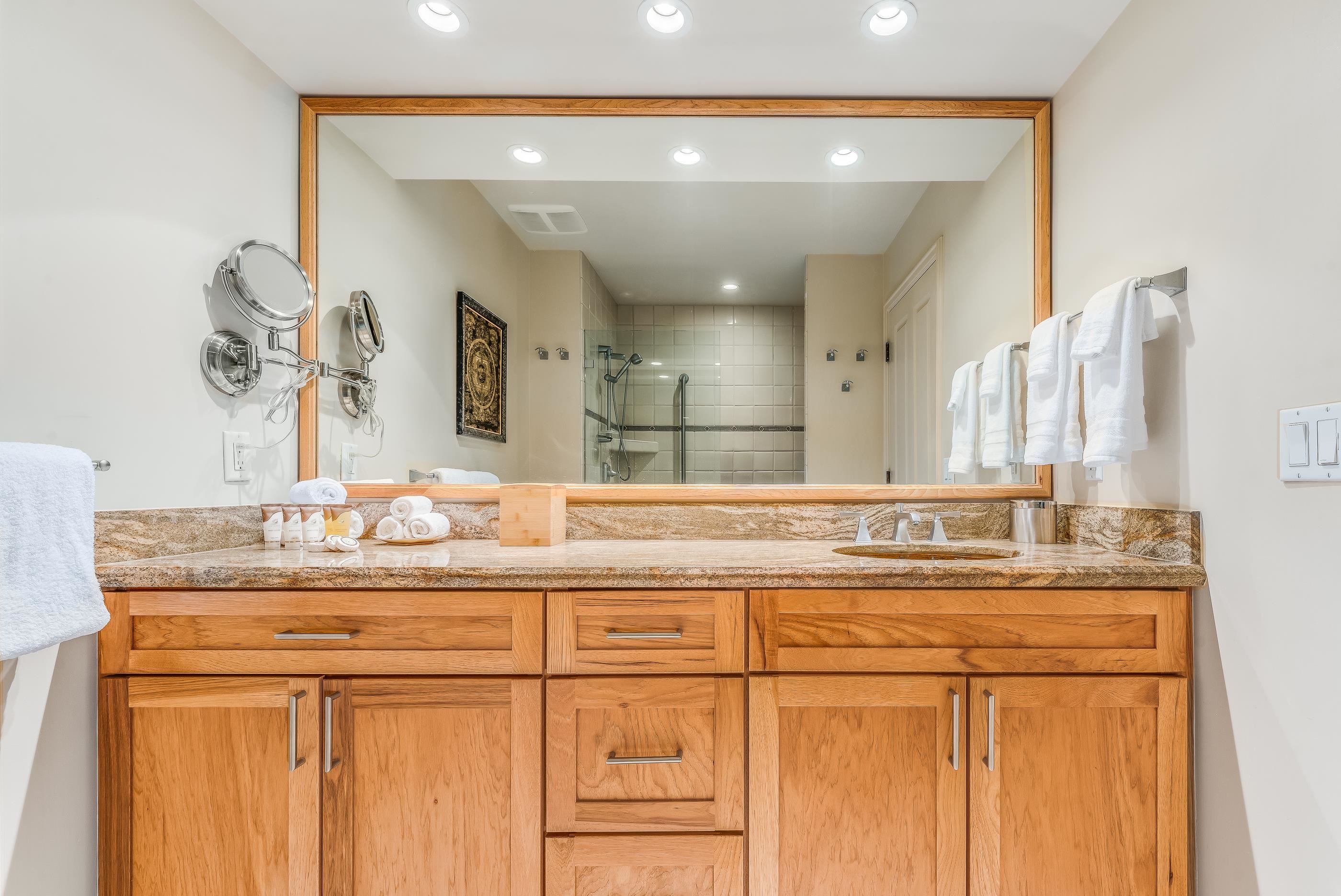 4850 Makena Alanui Road, Unit C106 Kihei, HI 96753 - Photo 24 of 49 a bathroom with a sink and a mirror