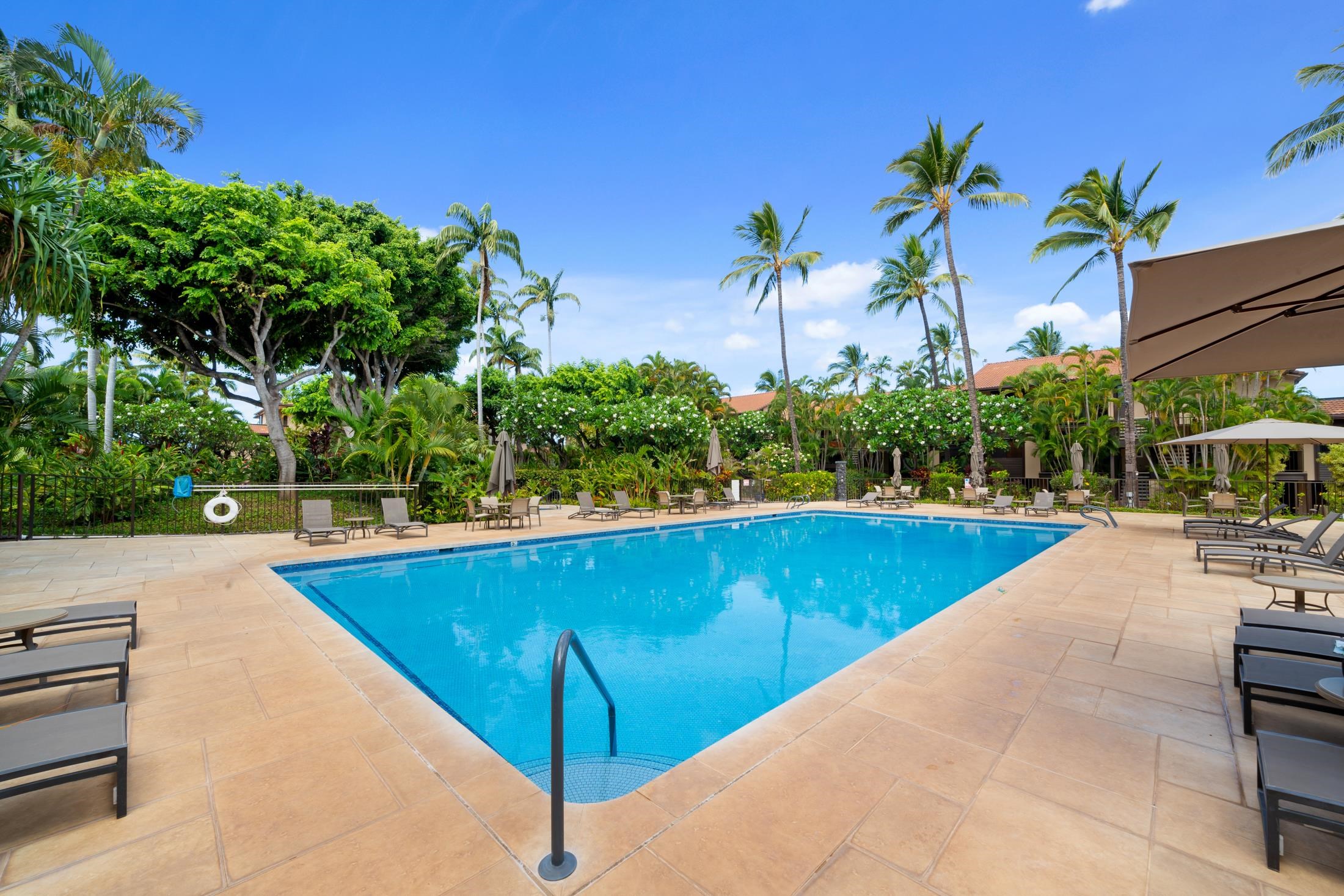 4850 Makena Alanui Road, Unit C106 Kihei, HI 96753 - Photo 38 of 49 a view of a swimming pool with lounge chair