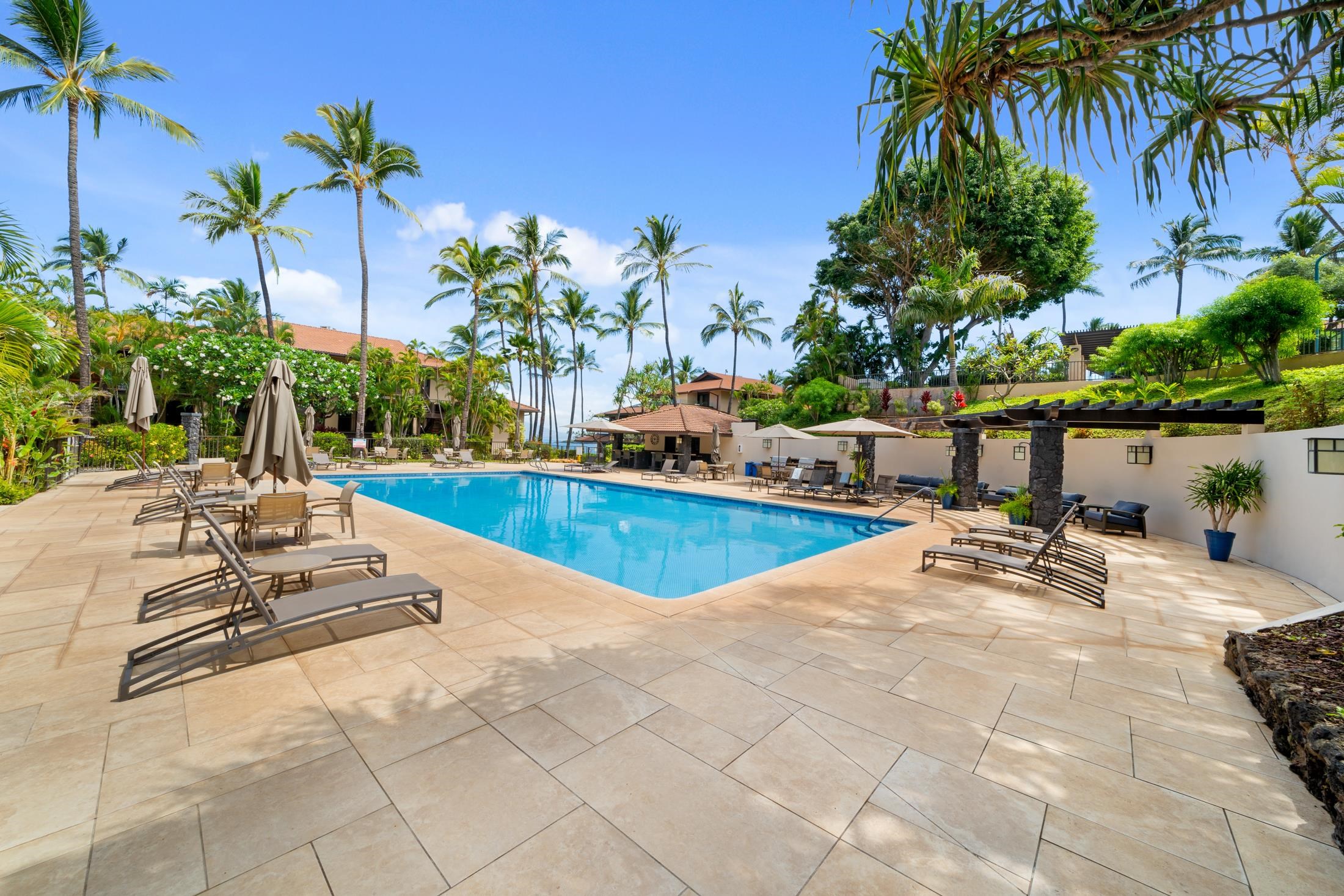 4850 Makena Alanui Road, Unit C106 Kihei, HI 96753 - Photo 39 of 49 a view of a swimming pool with a patio