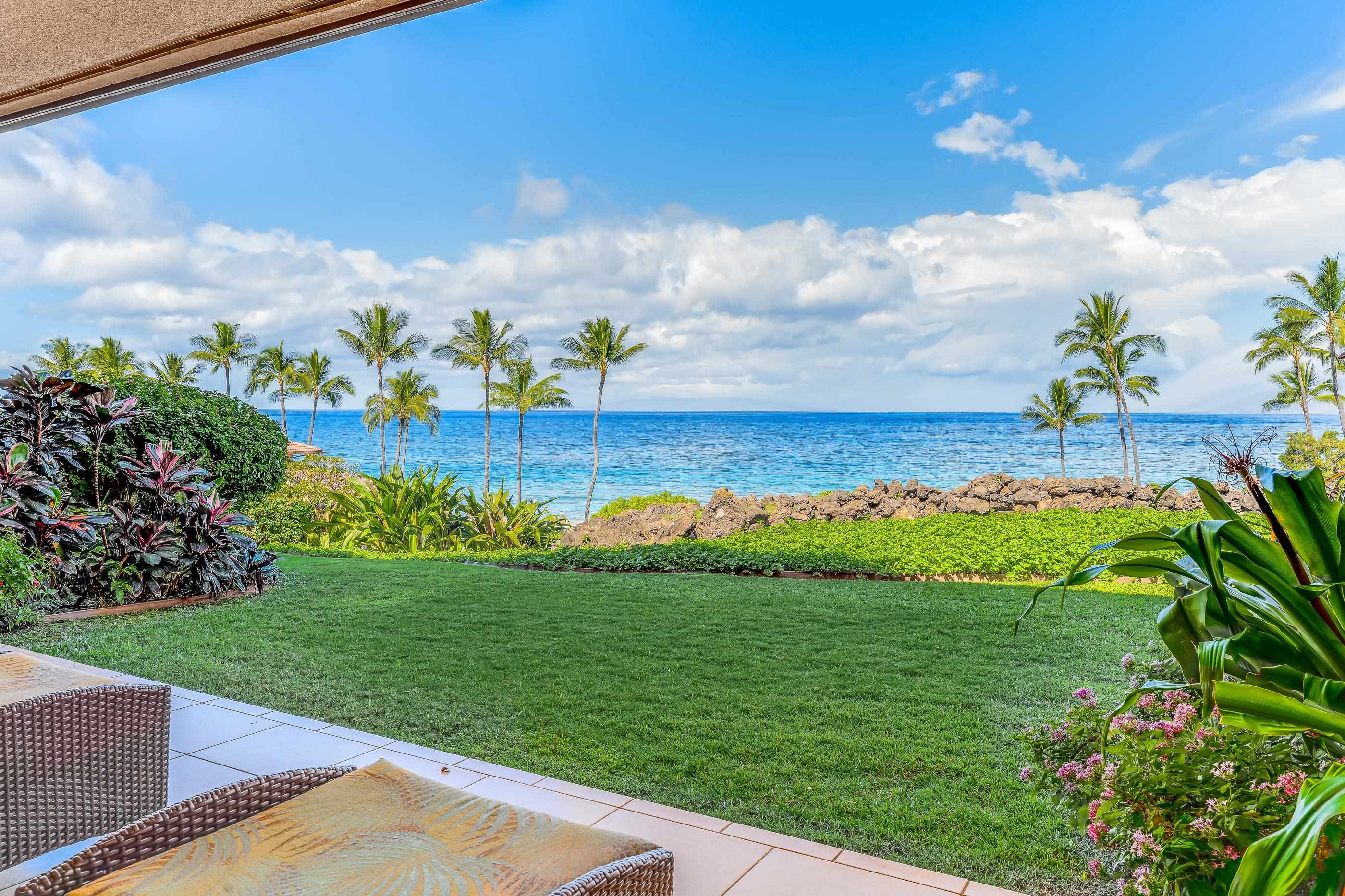 4850 Makena Alanui Road, Unit C106 Kihei, HI 96753 - Photo 5 of 49 a view of a yard and an ocean