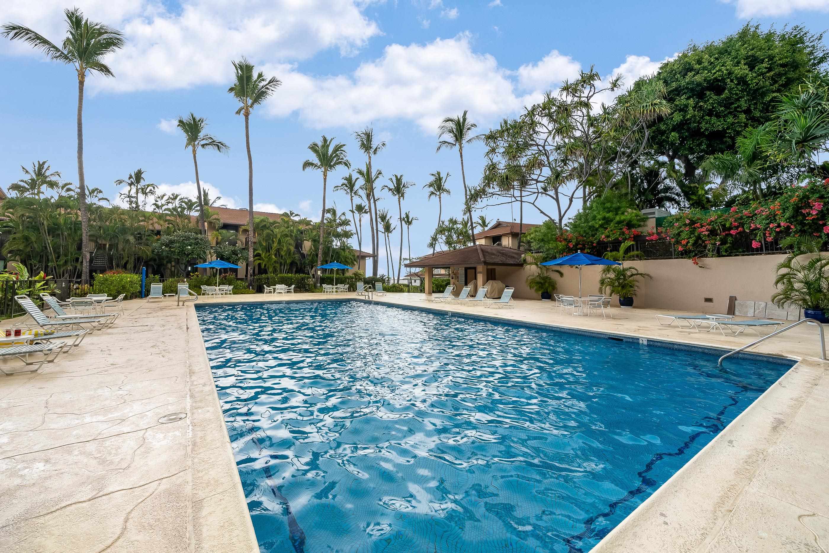 4850 Makena Alanui Road, Unit C106 Kihei, HI 96753 - Photo 8 of 49 a view of a swimming pool with a patio