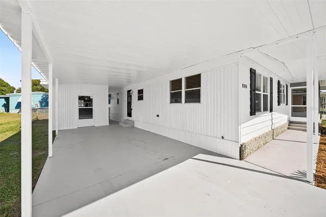 a view of a hallway with staircase