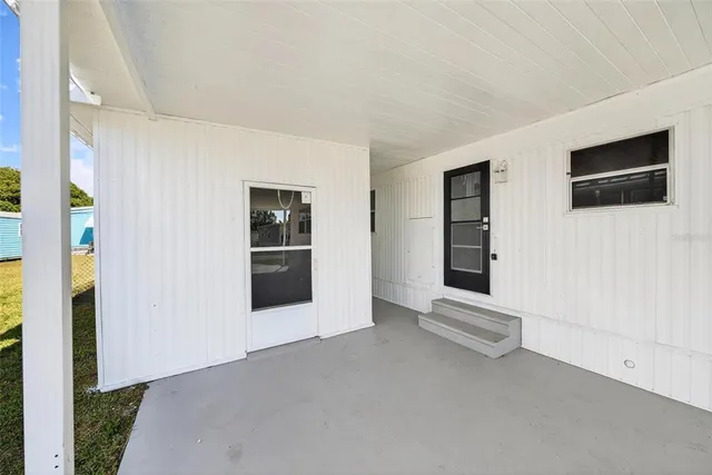 an aerial view of ocean residential houses with outdoor space