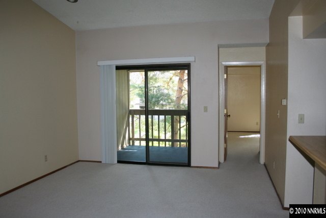 4394 Matich Drive Reno, NV 89502 - Photo 6 of 8 a view of an empty room with a window and bathroom