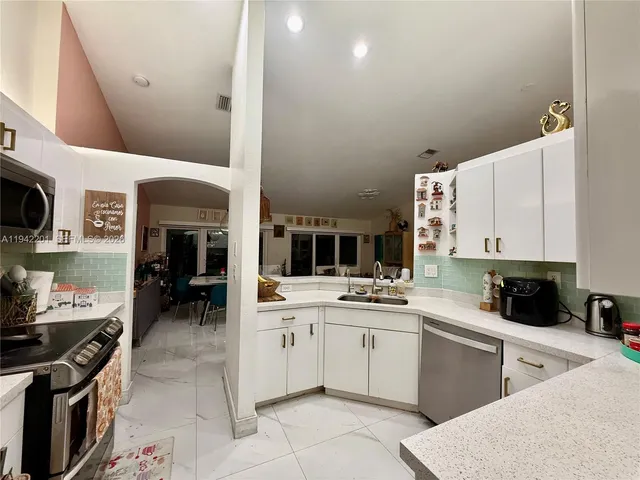 a view of a sign board with a big yard