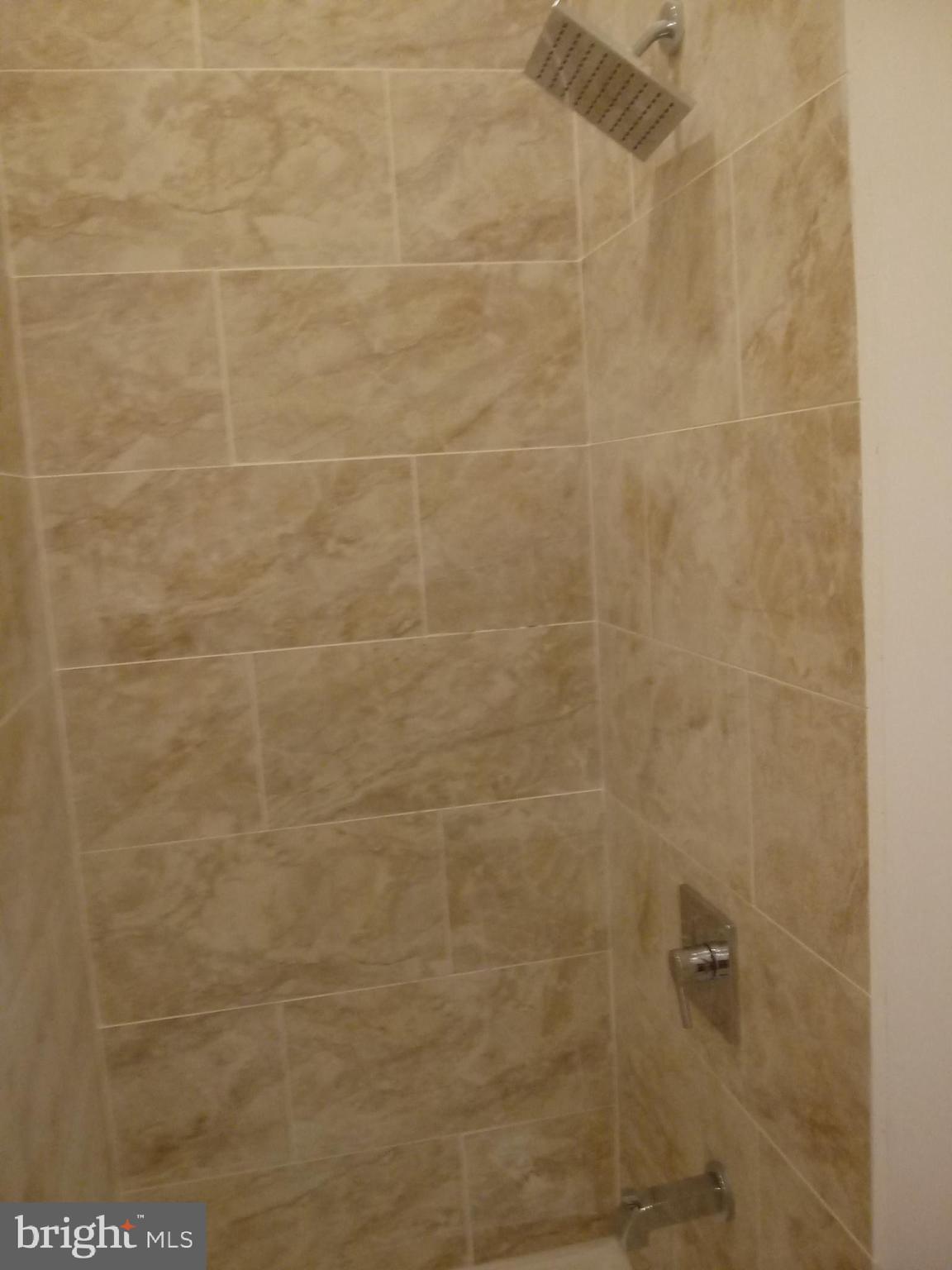 1145 South 23rd Street, Unit 1 Philadelphia, PA 19146 - Photo 5 of 12 a bathroom with a shower