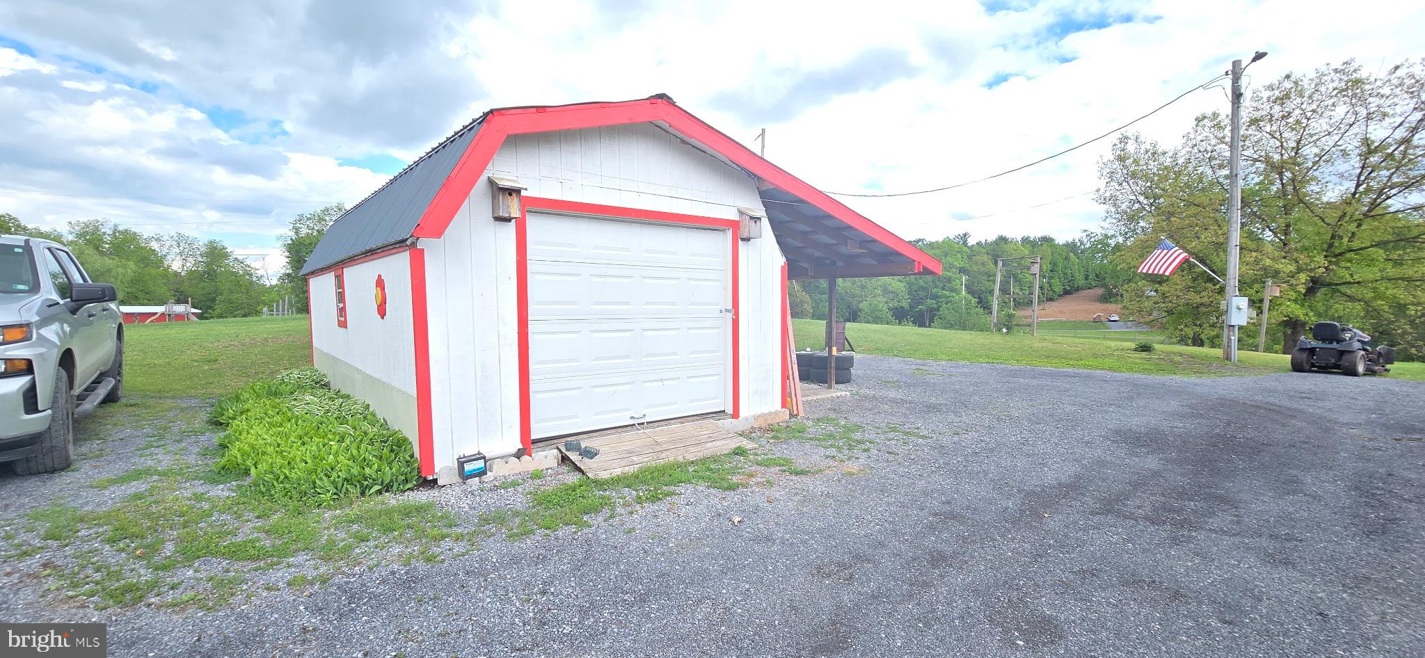 167 Cromwell Ridge Road Hustontown, PA 17229 - Photo 2 of 9 Charming garage with vibrant accents.