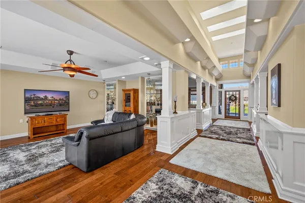 a living room with furniture and a rug