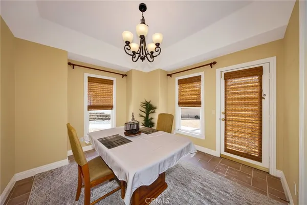 a kitchen with a stove sink and cabinets