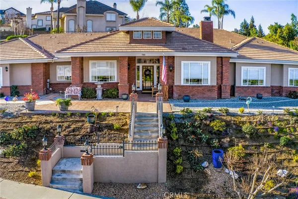 front view of a house with a patio