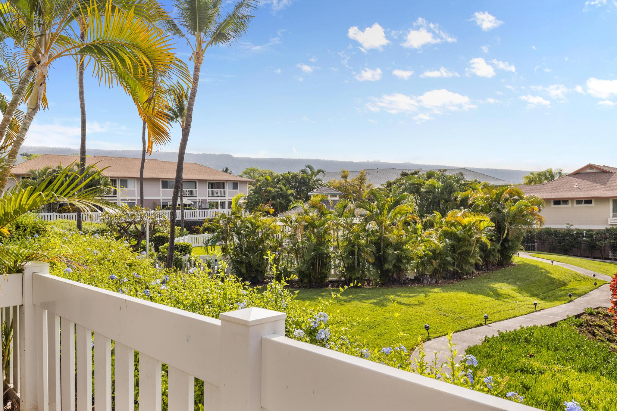 75-6081 Alii Drive, Unit V106 Kailua-Kona, HI 96740 - Photo 9 of 25 a view of swimming pool from a balcony