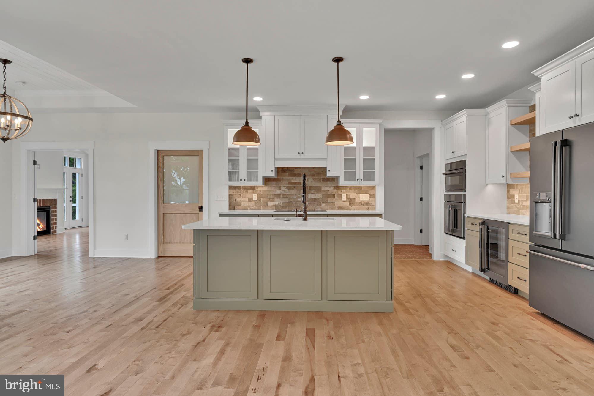 786 Fairview Road Mount Joy, PA 17552 - Photo 13 of 45 a kitchen with kitchen island a counter top space appliances and a cabinets