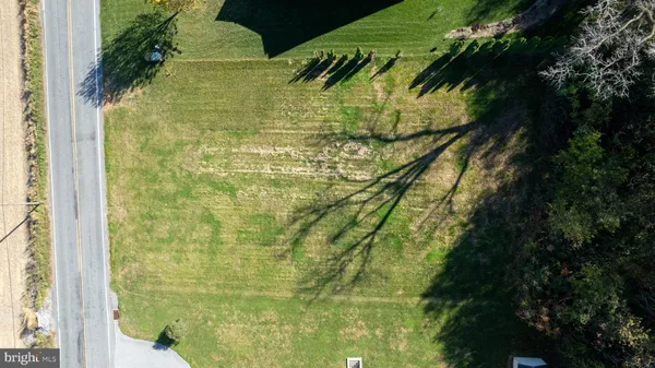 a view of a yard with an outdoor space