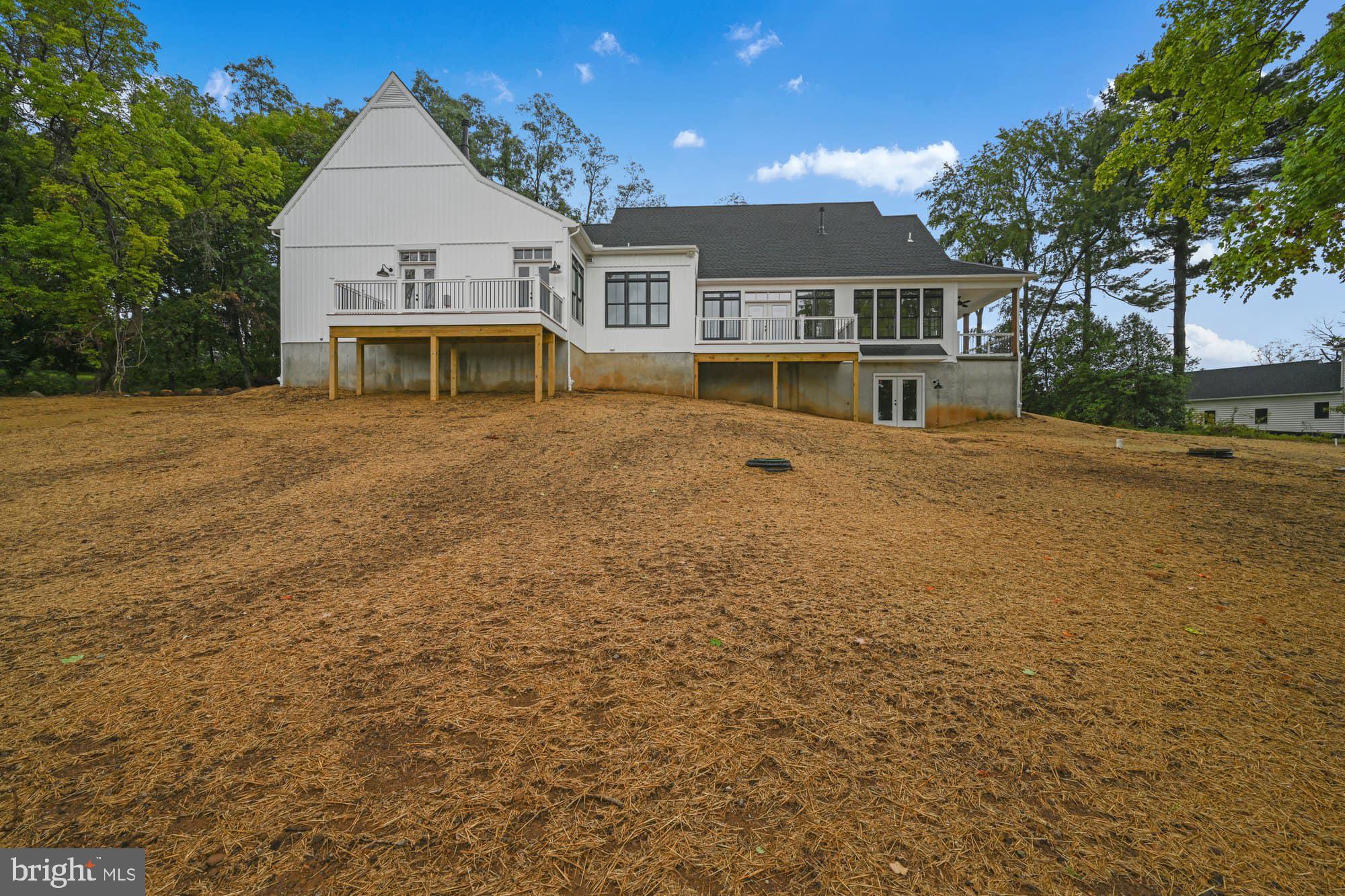 786 Fairview Road Mount Joy, PA 17552 - Photo 5 of 45 a front view of a house with a yard and garage