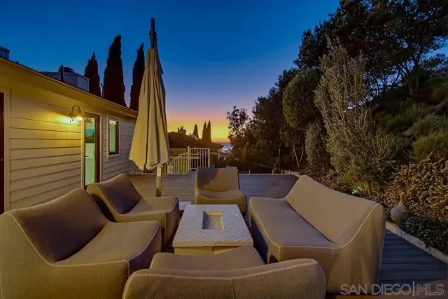 a view of outdoor sitting area with furniture
