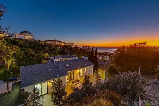a view of a city with tall buildings in background