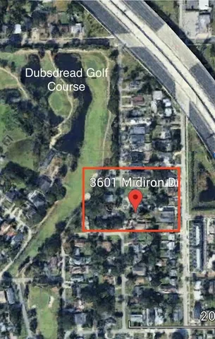 a view of a street with cars