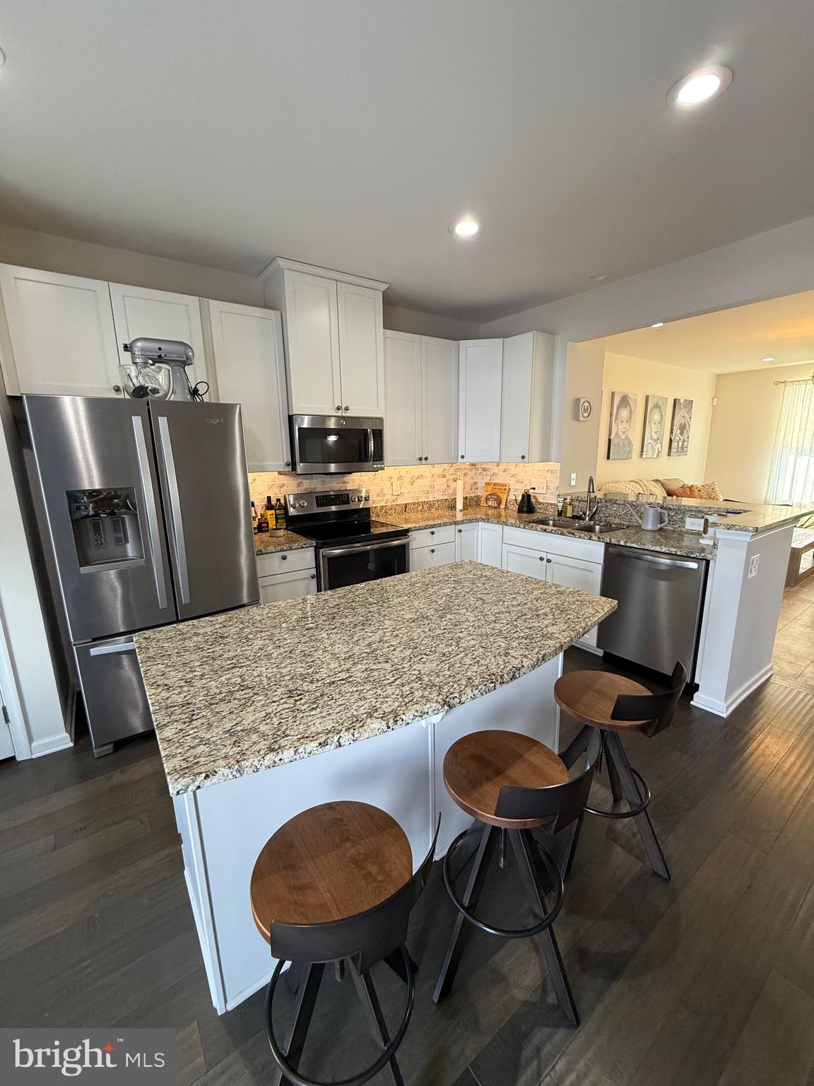 314 Iannelli Road Clarksboro, NJ 08020 - Photo 11 of 29 a kitchen with stainless steel appliances granite countertop a table chairs and a refrigerator