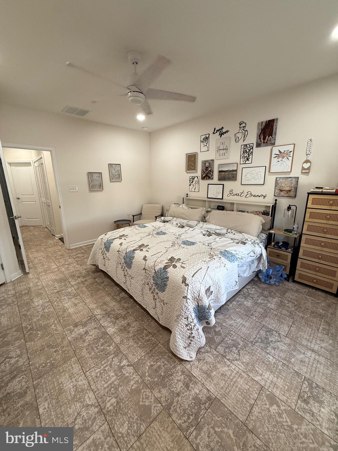 314 Iannelli Road Clarksboro, NJ 08020 - Photo 15 of 29 a spacious bedroom with a bed and a couch
