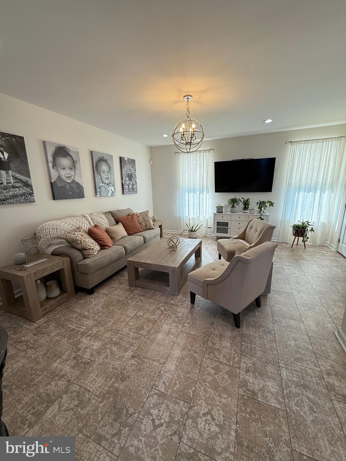 314 Iannelli Road Clarksboro, NJ 08020 - Photo 7 of 29 a living room with furniture and a flat screen tv