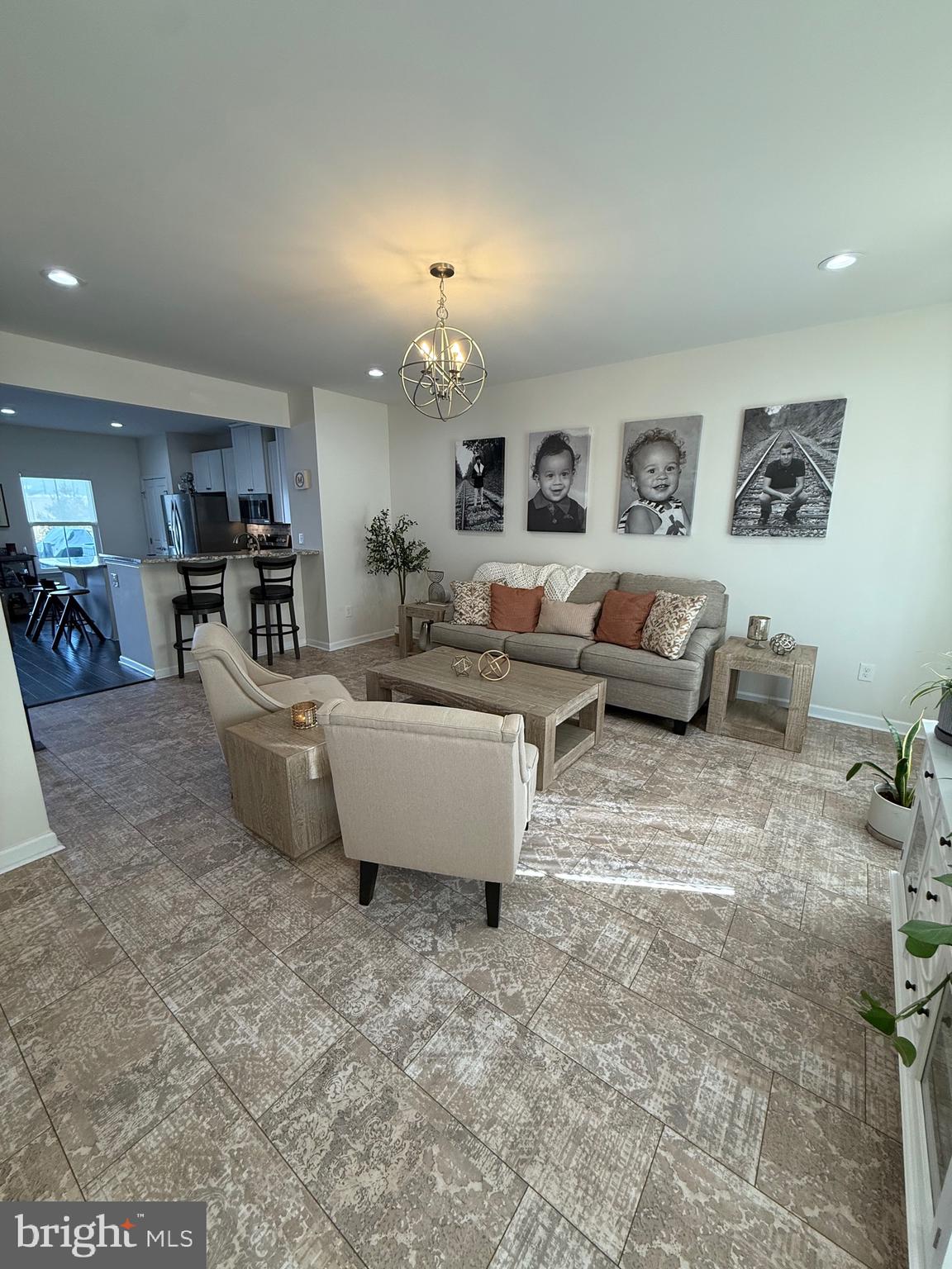 314 Iannelli Road Clarksboro, NJ 08020 - Photo 8 of 29 a living room with furniture and a chandelier