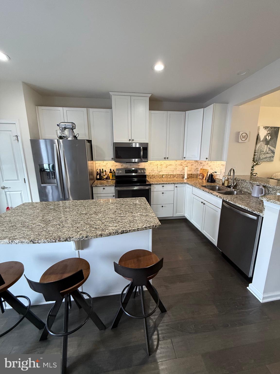314 Iannelli Road Clarksboro, NJ 08020 - Photo 10 of 29 a kitchen with stainless steel appliances granite countertop a stove a sink a counter space and chairs