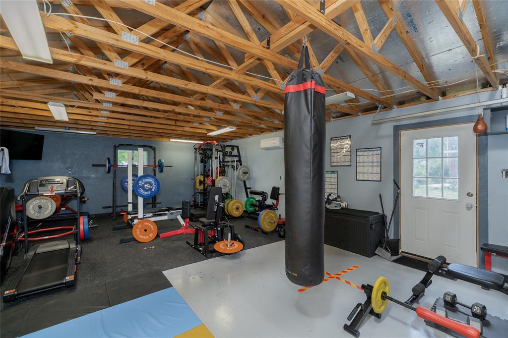 135 Kirkpatrick Road Ennis, TX 75119 - Photo 39 of 40 a view of a room with gym equipment