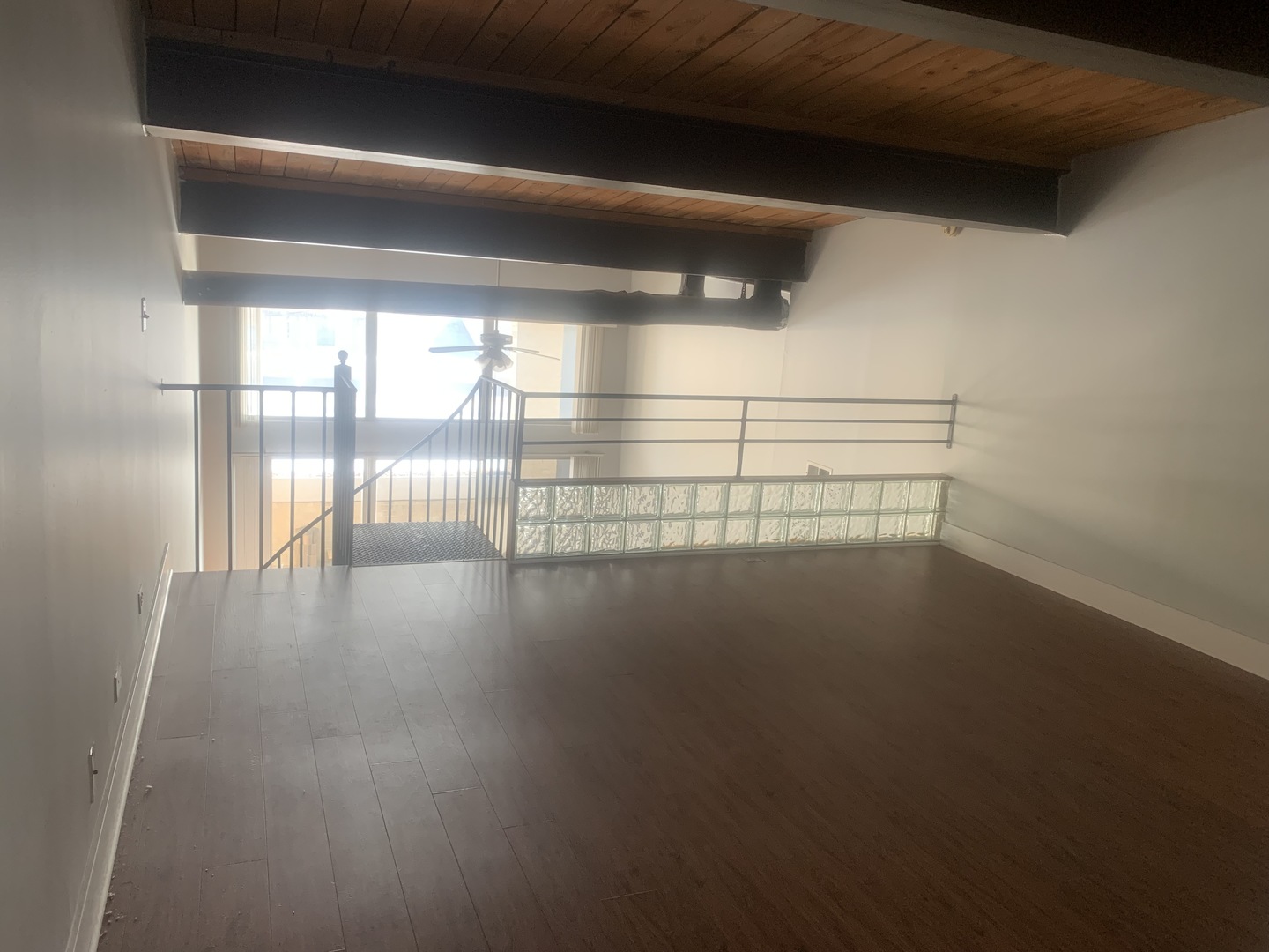 925 Green Bay Road, Unit 18 Winnetka, IL 60093 - Photo 5 of 10 a view of water heater room with wooden floor