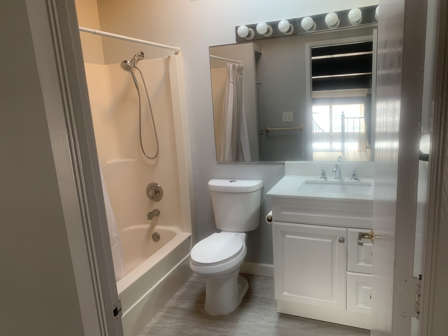 925 Green Bay Road, Unit 18 Winnetka, IL 60093 - Photo 9 of 10 a bathroom with a toilet and a sink