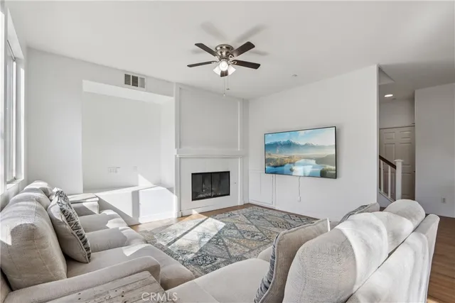 a bedroom with furniture and a fireplace