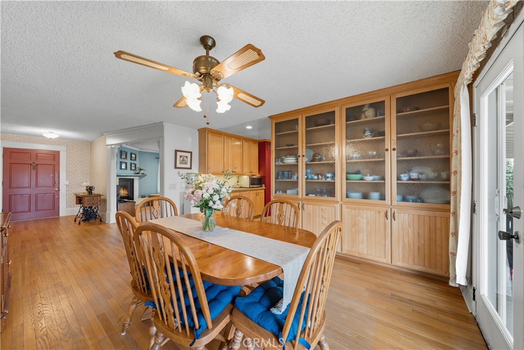 1181 Gearald Way Fallbrook, CA 92028 - Photo 12 of 39 a view of a dining room with furniture window and wooden floor
