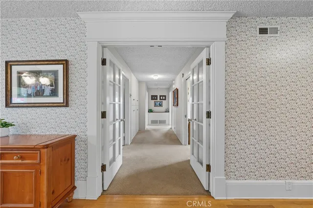 a view of gallery with door