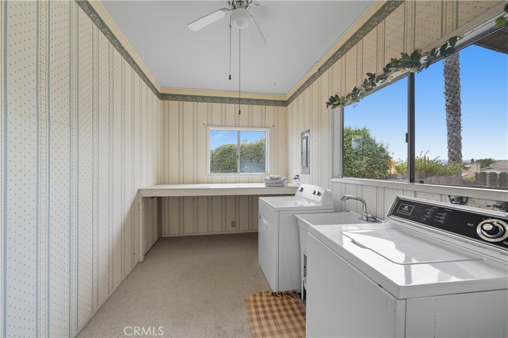 1181 Gearald Way Fallbrook, CA 92028 - Photo 29 of 39 a kitchen with a sink and a stove top oven
