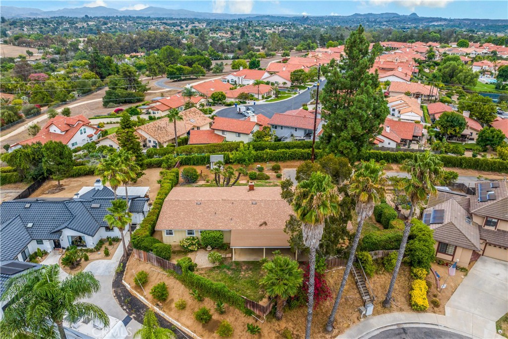 1181 Gearald Way Fallbrook, CA 92028 - Photo 35 of 39 an aerial view of house with yard swimming pool and mountains