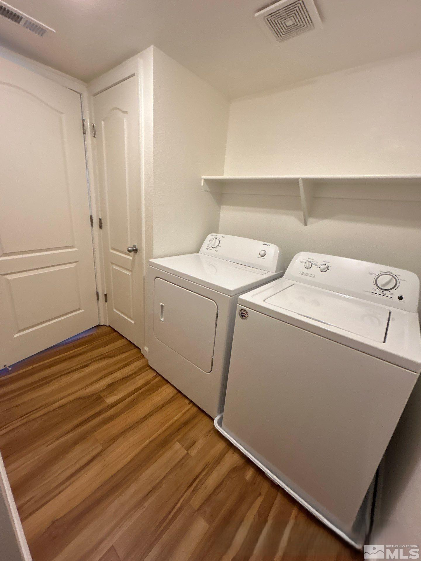 6850 Sharlands Avenue, Unit AB2170 Reno, NV 89523 - Photo 12 of 16 a utility room with dryer and washer